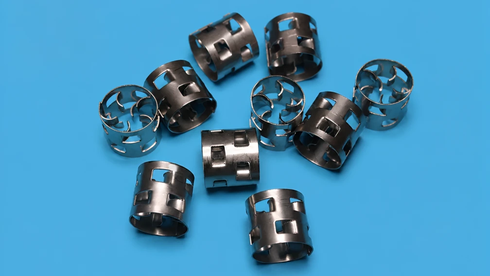 Carbon Raschig Rings in HF Acid and Caustic Absorption: Chemical Resistance and Design